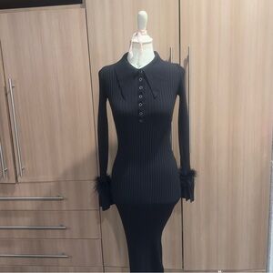 Elegant Black Ribbed Dress with Feather Cuffs